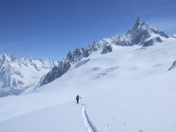 Going up to the Col d'Entreves with the Dent du Geant behind top right, and the Vallee blanche below on the left.