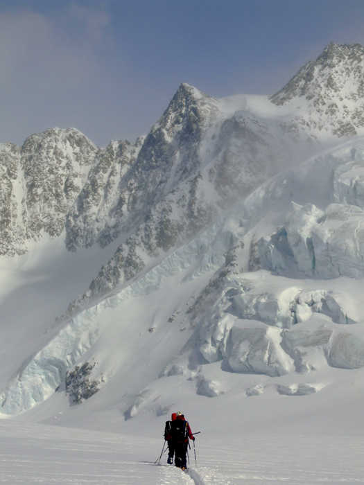 Descending through thick snow beneath the Wildspitze icefalls, tztal Alps.