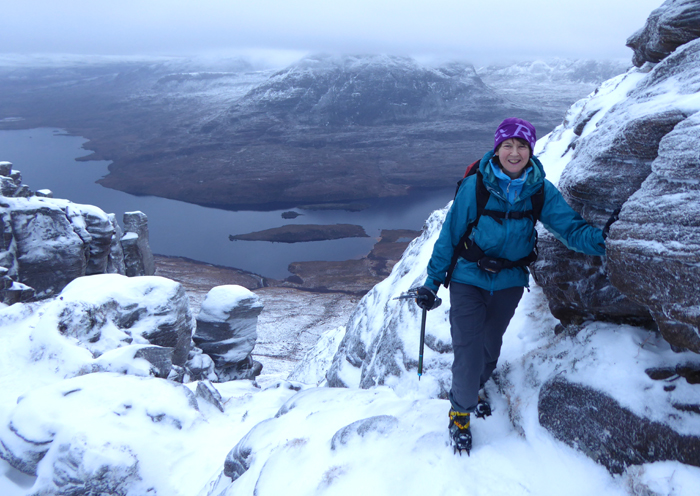 Winter scxrambling on Stac Pollaidh, Northwest Highlands, Scotland. 