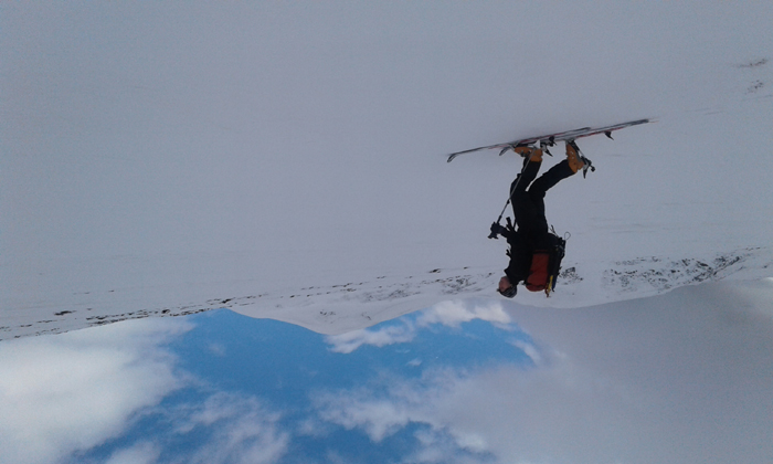 Skinning up the 849m high peak of Bac an Eich. 