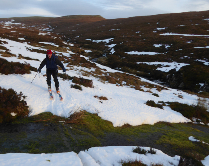 Skiing down the last of the snow on Ben Wyvis. 