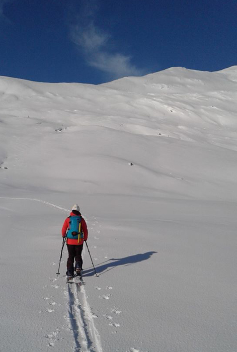 Sioned with her splitboard on Meall nan Tarmachan, Ben Lawers area, Scotland, March 2020. 