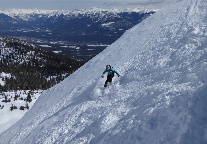 Emma Livingston skiing the steep side-country at Kicking Horse resort