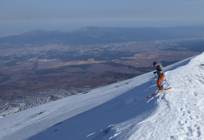 Skiiing down Fuji, Japan. 